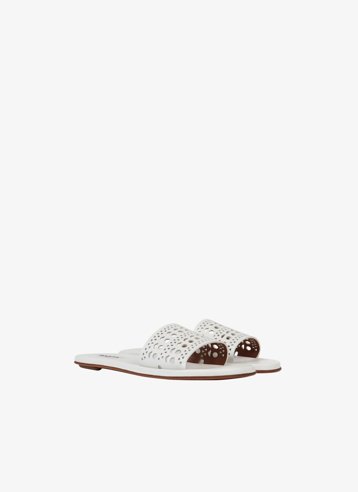 MULES IN VIENNE CALFSKIN ALAÏA WHITE MULES IN VIENNE CALFSKIN